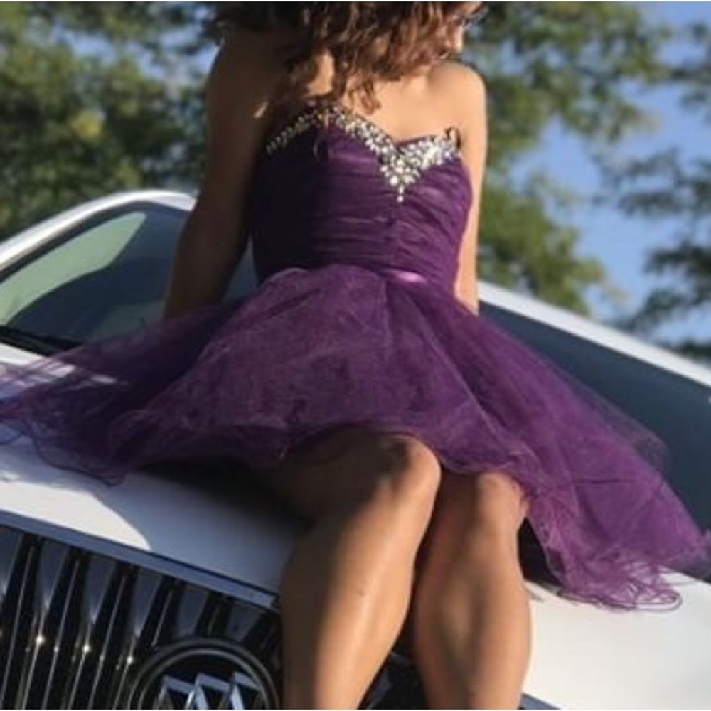 Purple stunning short strapless dress. Worn once ma square brand.
